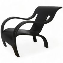 A single sheet bent plywood chair, in the manner of Gerald Summers, black painted, applied label