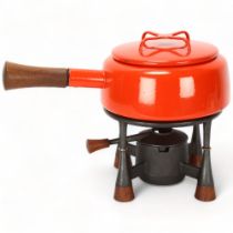 JENS QUISTGAARD for Dansk Design, a mid 20th century fondue set, with cast iron base and teak mounts
