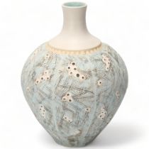 A porcelain studio pottery vase with sgraffito decoration and matt glaze, makers mark to base JB?,