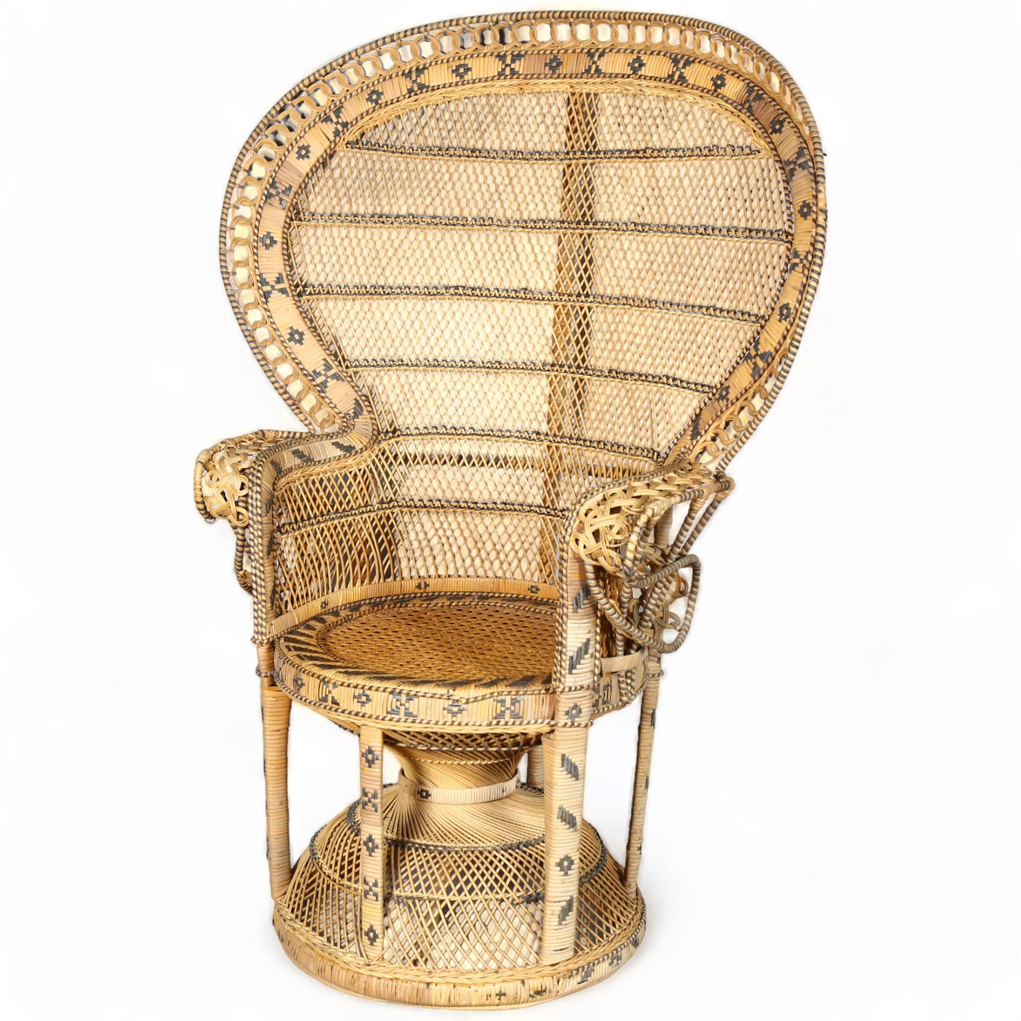 A 1960s/70s rattan Peacock chair, height 136cm The rattan has faded and the outer edge of both