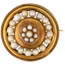 A Victorian whole pearl flowerhead cluster mourning brooch, circa 1880, circular form with central