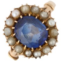 An early 20th century blue paste and pearl cluster ring, apparently unmarked, setting height 14.2mm,