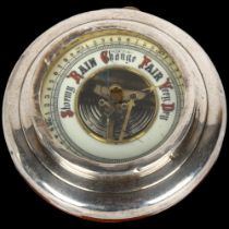 A George V silver-mounted oak barometer, possibly Wagner & Gerstley Ltd, London 1927, diameter