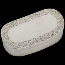 A George III silver snuffbox, Samuel Pemberton, Birmingham 1800, oval curved form with bright-cut