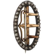 A Georgian silver and gold diamond buckle brooch, cut-down collet set with old-cut diamonds, 25mm,