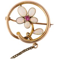 An Edwardian 9ct rose gold opal and ruby floral openwork brooch, circa 1905, 23.7mm, 2.5g No