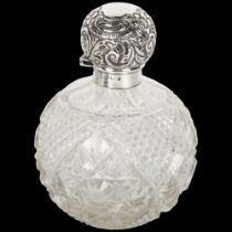 An Edwardian silver-mounted hob nail glass dressing table perfume bottle, Martin Hall & Co,