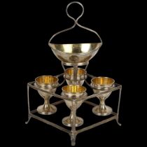 A George III silver 4 cup breakfast egg set, Peter & Anne Bateman, London 1798, the lozenge frame