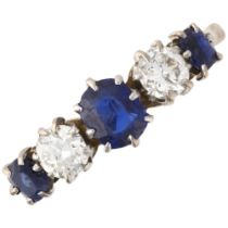 An 18ct gold graduated five stone sapphire and diamond ring, claw set with oval mixed-cut