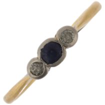An early 20th century 18ct gold three stone sapphire and diamond ring, total diamond content