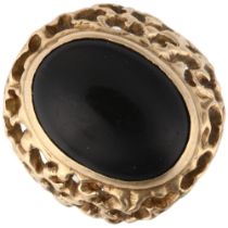 A large 9ct gold onyx signet ring, circa 1970s, setting height 25.1mm, size approx P, 10.6g Shank is