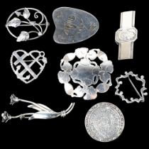 8 Danish silver brooches, makers include Hugo Grun and Weihe, largest 67.6mm, 73.4g total (8) No