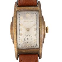 BULOVA - an American gold plated stainless steel mechanical wristwatch, circa 1940s, silvered dial