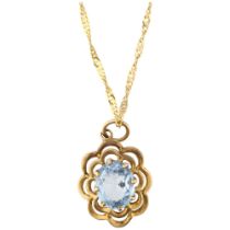 A late 20th century 9ct gold blue topaz flowerhead pendant necklace, London 1972, on 9ct Prince of