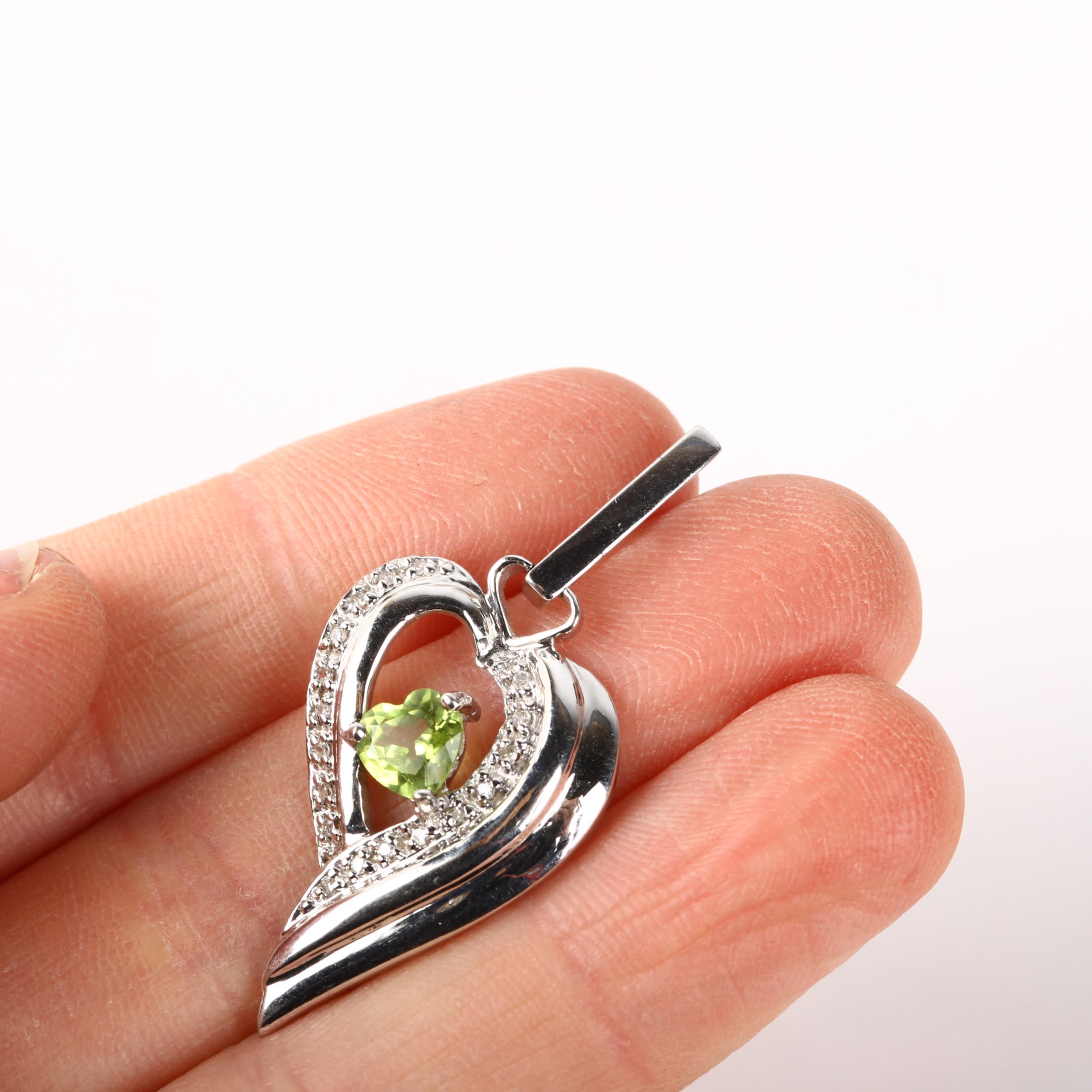 A modern 9ct white gold peridot and diamond heart cluster pendant, 41mm, 3.7g No damage or repair, - Image 4 of 4