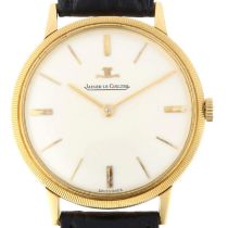 JAEGER LECOULTRE - an 18ct gold mechanical wristwatch, ref. 1922, circa 1960s, silvered dial with