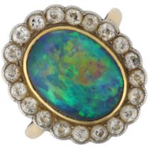 A black opal and diamond oval cluster ring, mid-20th century, rub-over set with 2.5ct oval