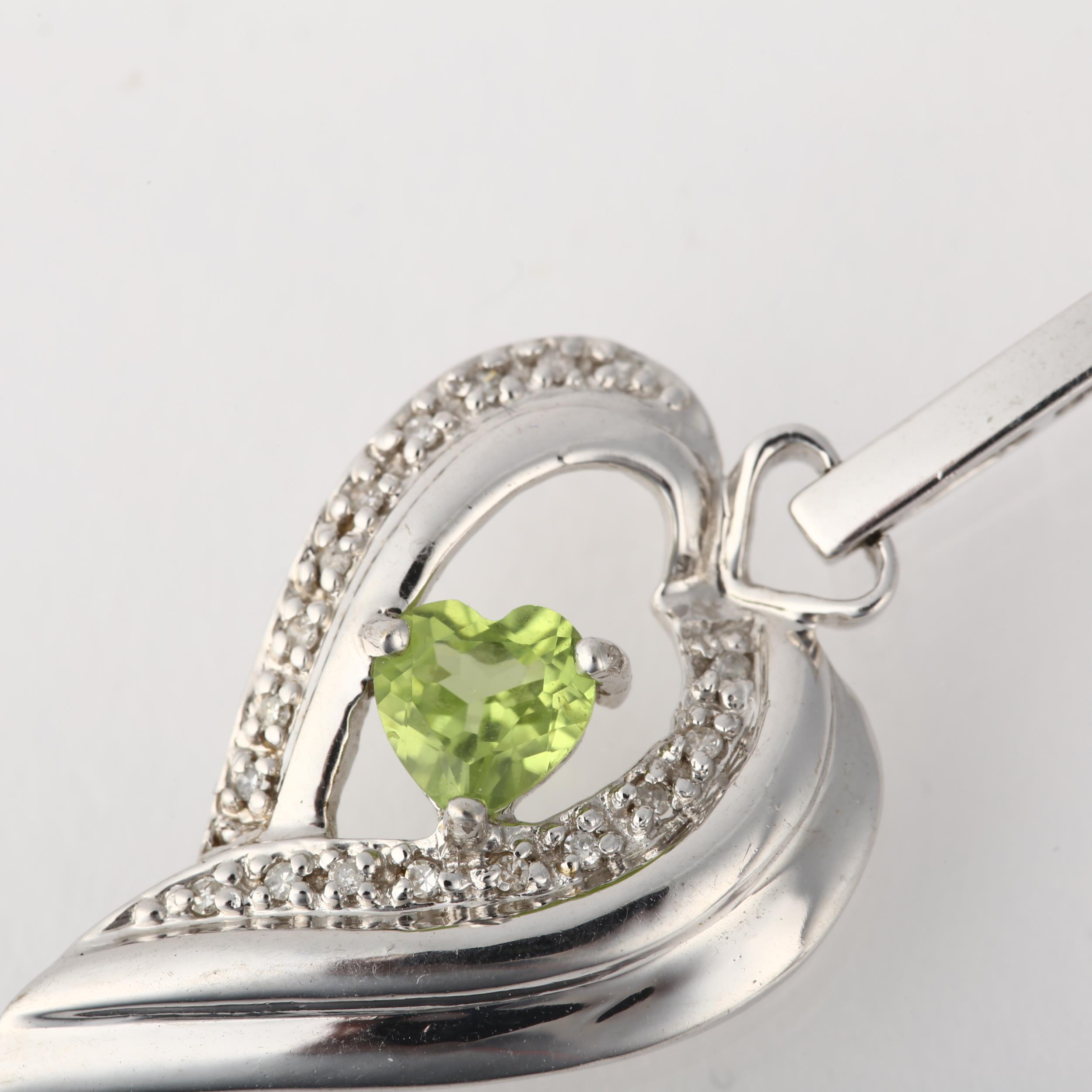 A modern 9ct white gold peridot and diamond heart cluster pendant, 41mm, 3.7g No damage or repair, - Image 2 of 4