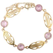 An Edwardian pink paste panel openwork bracelet, apparently unmarked, 17cm, 9.4g Clasp has been