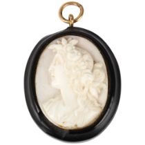 A 19th century coral cameo pendant, relief carved depicting Classical female profile, 40.4mm, 10.