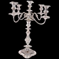 An early 20th century silver plated 5-light table candelabrum, with foliate acanthus baluster