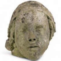 A carved stone head, study of a young girl in a bonnet, H29cm