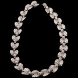 HERMANN SIERSBOL - a Danish sterling silver leaf and berry panel necklace, 37cm