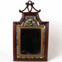 A 19th Century mahogany-framed courting mirror, with a floral and bird painted glass cushion