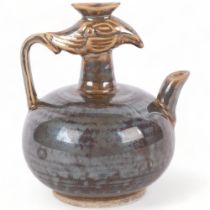 A Chinese brown glazed jug with bird's head design, H13.5cm