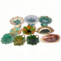 A collection of Victorian Majolica leaf plates, shell bowl, and 3 comports (10)