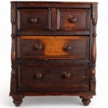 A Victorian apprentice piece stained pine table-top chest of 2 short and 2 long drawers, with