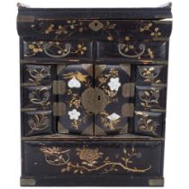 Antique Oriental lacquered jewel cabinet, with rising top, fitted interior, and painted and gilded