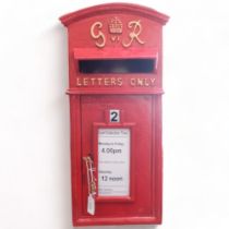 A large cast-iron Royal Mail reproduction post box, H58cm, with key