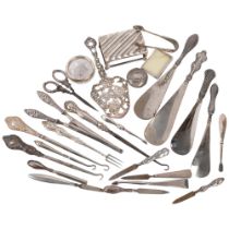 Various silver-mounted items, including shoe horns, table-top matchbox holder, pastry serving slice,