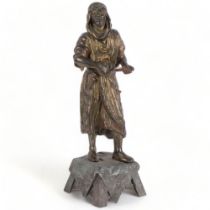 A spelter figure on stand of an Arab musician, unmarked, H46cm
