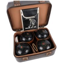 An unusual bag with the base fitted with Henselite bowling balls, 34cm across