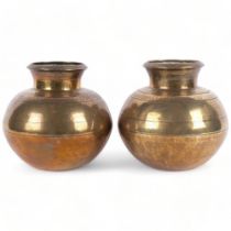 A pair of 19th century Indian heavy gauge brass vases, with engraved animals and geometric bands,