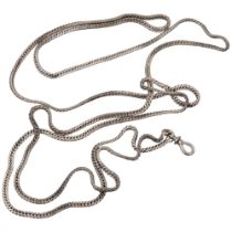 A Continental unmarked silver curb link long guard chain, 120cm