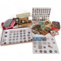 A box of British and foreign coins, bank bags, commemorative coins, etc