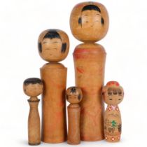 A group of 5 painted Japanese wood Kokeshi dolls, tallest 46cm