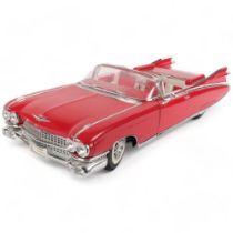 A Maisto 1/12 scale diecast model of a 1959 Cadillac Eldorado Biarritz, in original box and