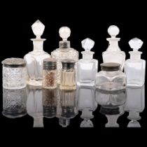 Various glass jars, including some silver-topped