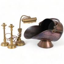 An Antique copper coal scuttle, a pair of unmarked brass candlesticks, H28cm, and an unmarked