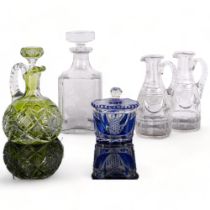 A green Bohemian cut-glass decanter, with associated stopper, H21cm, a Bohemian blue cut-glass jar