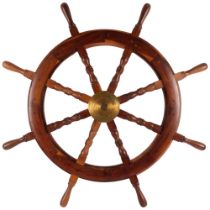 A large reproduction ship's wheel, diameter 68cm