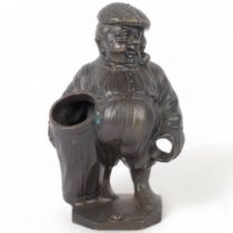 A cast-bronze golfer figure pen holder, H18cm