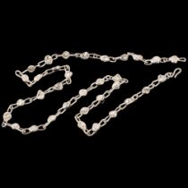 A long and heavy silver plated abstract link chain necklace, 76cm