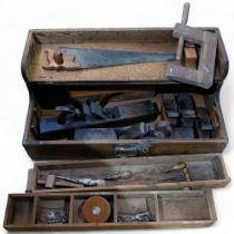 An Antique stained pine carpenter's tool box, and various tools including various planes and other