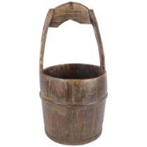 A Chinese wooden well bucket, 54cm