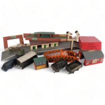 A large quantity of Vintage train stations, O and OO gauge related in nature, including various